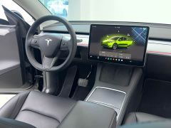 Tesla Model Y Rear-Wheel Drive - ფოტო 18