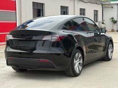 Tesla Model Y Standard Range Edition - ფოტო 15