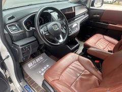 Honda Odyssey 2.0L e:HEV Sharp Comfort Edition - photo 10