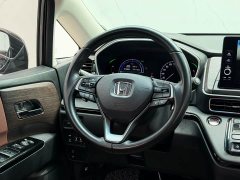 Honda Odyssey 2.0L e:HEV Sharp Premium Edition - ფოტო 11