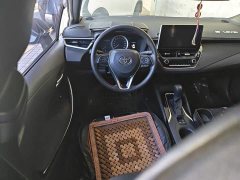 Toyota Corolla Hybrid 1.8H E-CVT Luxury - ფოტო 6