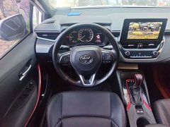 Toyota Corolla Hybrid 1.8H E-CVT Sport - ფოტო 11