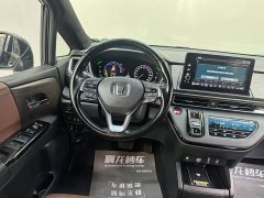 Honda Odyssey 2.0L e:HEV Sharp Radiance Edition - ფოტო 11