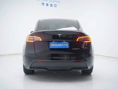 Tesla Model Y Standard Range RWD - ფოტო 11