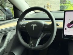 Tesla Model Y Standard Range RWD - ფოტო 14