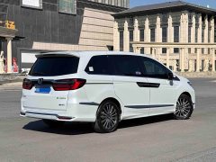 Honda Odyssey 2.0L e:HEV Luxury - ფოტო 5