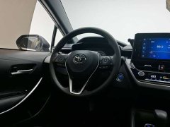 Toyota Corolla 2022 Hybrid 1.8H E-CVT Luxury - ფოტო 19