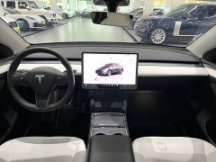 Tesla Model Y Rear-Wheel Drive - ფოტო 4