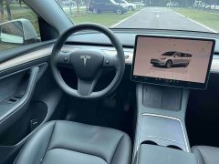 Tesla Model Y Rear-Wheel Drive - ფოტო 18
