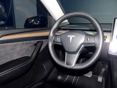 Tesla Model Y Standard Range RWD - ფოტო 11