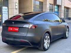 Tesla Model Y Standard Range RWD - ფოტო 11