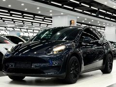 Tesla Model Y Rear-Wheel Drive - ფოტო 1