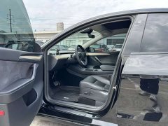 Tesla Model Y Rear-Wheel Drive - ფოტო 4