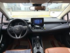 Toyota Corolla 2021 Hybrid 1.8L E-CVT Elite - ფოტო 7