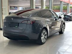 Tesla Model Y Standard Range RWD - ფოტო 11
