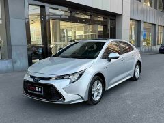 Toyota Corolla Hybrid 1.8H E-CVT Luxury - ფოტო 1