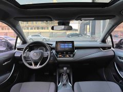 Toyota Corolla Hybrid 1.8H E-CVT Luxury - ფოტო 5