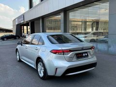 Toyota Corolla Hybrid 1.8H E-CVT Luxury - ფოტო 7
