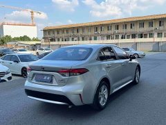 Toyota Corolla Hybrid 1.8H E-CVT Luxury - ფოტო 9