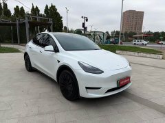 Tesla Model Y Rear-Wheel Drive - ფოტო 4