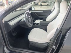 Tesla Model Y Rear-Wheel Drive - ფოტო 4