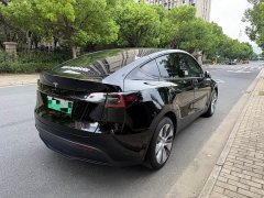Tesla Model Y Standard Range RWD - ფოტო 18