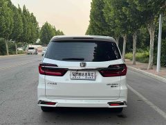 Honda Odyssey 2.0L e:HEV Sharp Premium Edition - ფოტო 8
