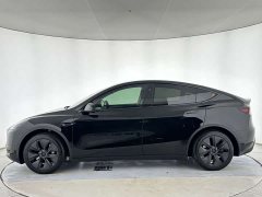 Tesla Model Y Rear-Wheel Drive - ფოტო 4