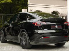 Tesla Model Y Rear-Wheel Drive - ფოტო 4
