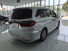 Honda Odyssey 2.0L e:HEV Luxury - ფოტო 4