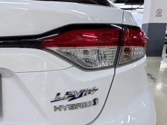 Toyota Corolla Hybrid 1.8H E-CVT Base - ფოტო 10