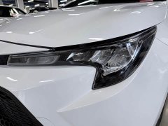 Toyota Corolla Hybrid 1.8H E-CVT Base - ფოტო 11
