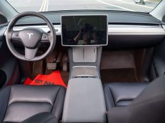 Tesla Model Y Rear-Wheel Drive - ფოტო 16
