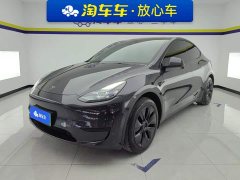 Tesla Model Y Rear-Wheel Drive - ფოტო 1