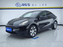 Tesla Model Y Rear-Wheel Drive - ფოტო 1