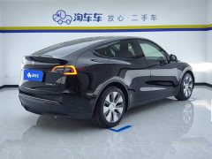 Tesla Model Y Rear-Wheel Drive - ფოტო 3