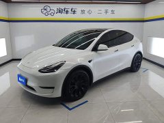 Tesla Model Y Standard Range RWD - ფოტო 1