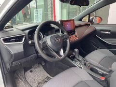 Toyota Corolla Hybrid 1.8H E-CVT Luxury - ფოტო 18