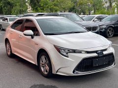 Toyota Corolla Hybrid 1.8H E-CVT Luxury - ფოტო 3