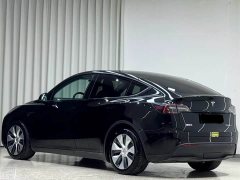 Tesla Model Y Rear-Wheel Drive - ფოტო 4