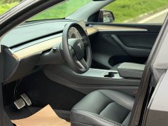 Tesla Model Y Standard Range RWD - ფოტო 4