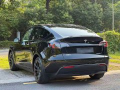 Tesla Model Y Standard Range RWD - ფოტო 11