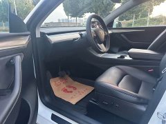 Tesla Model Y Long Range All-Wheel Drive - ფოტო 4