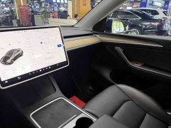 Tesla Model Y Standard Range RWD - ფოტო 11
