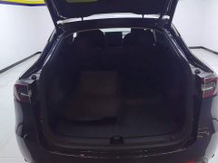 Tesla Model Y Rear-Wheel Drive - ფოტო 4