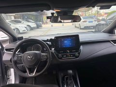 Toyota Corolla Hybrid 1.8H E-CVT Luxury - ფოტო 11