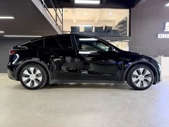Tesla Model Y Standard Range RWD - ფოტო 10