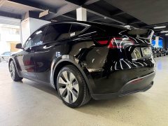 Tesla Model Y Standard Range RWD - ფოტო 11