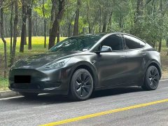 Tesla Model Y Rear-Wheel Drive - ფოტო 1