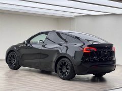 Tesla Model Y Standard Range RWD - ფოტო 17
